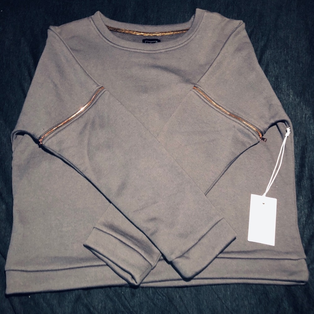 A lime and vine brand sweater.